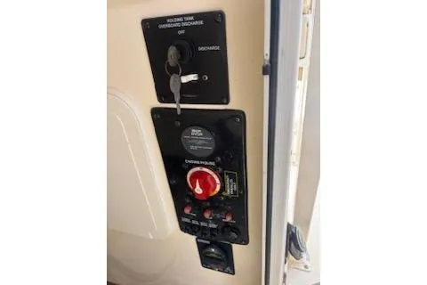 Slide: The Image of Control panel of a 2014 Scout 240 Bay Scout boat. - 9