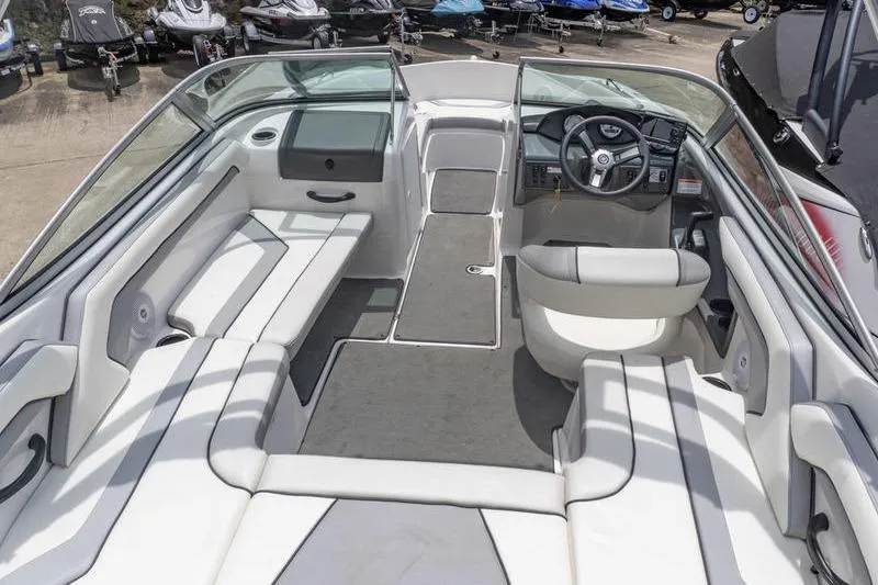 Slide: The Image of 2017 Yamaha Boats AR190 interior with seating and steering wheel, showcasing sleek design. - 26