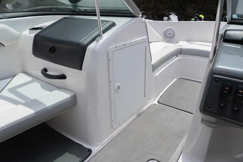 Slide: The Image of 2017 Yamaha Boats AR190 interior with seating and storage compartments. - 27