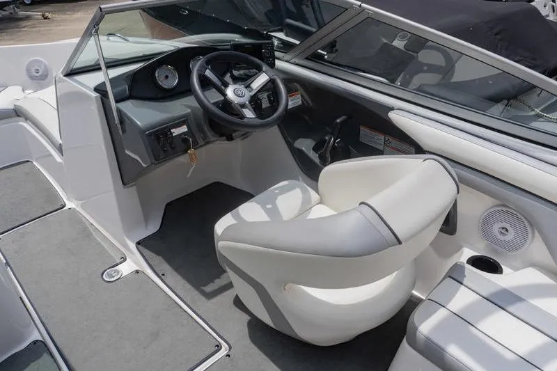 Slide: The Image of 2017 Yamaha Boats AR190 interior with steering wheel and seating. - 30