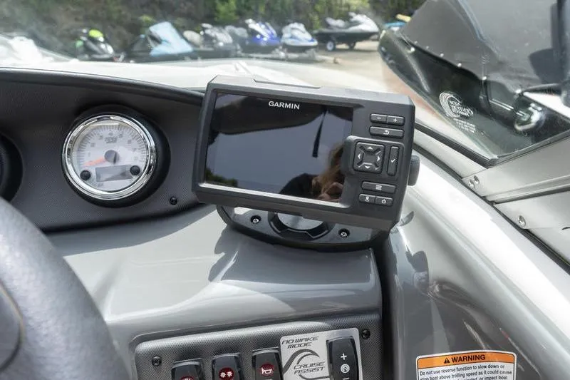 Slide: The Image of Dashboard of a 2017 Yamaha AR190 boat featuring a Garmin GPS device. - 32
