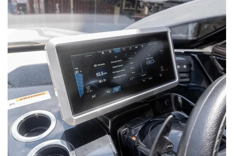 Slide: The Image of Dashboard of 2023 Yamaha Boats 275SDX featuring a modern touchscreen display. - 15