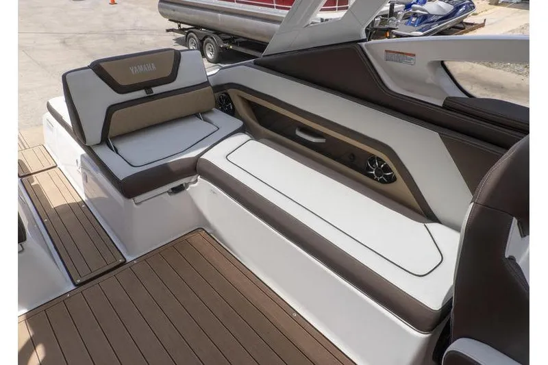 Slide: The Image of 2023 Yamaha Boats 275SDX interior with sleek seating and modern design. - 31