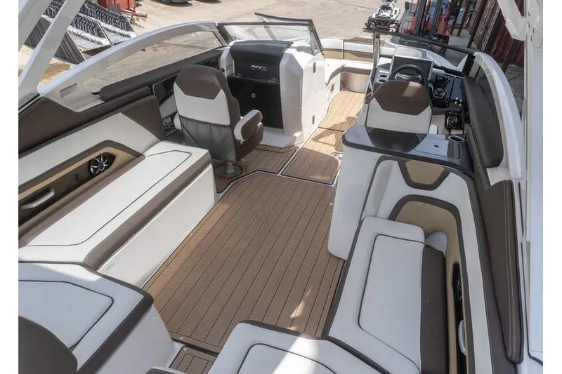 Slide: The Image of Interior of 2023 Yamaha Boats 275SDX, featuring sleek seating and modern dashboard design. - 7