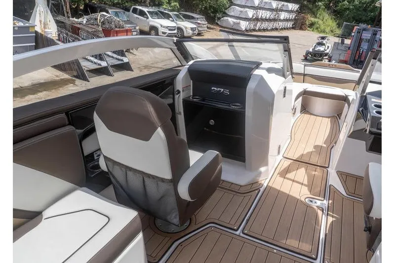 Slide: The Image of 2023 Yamaha Boats 275SDX interior with sleek design and modern dashboard. - 8