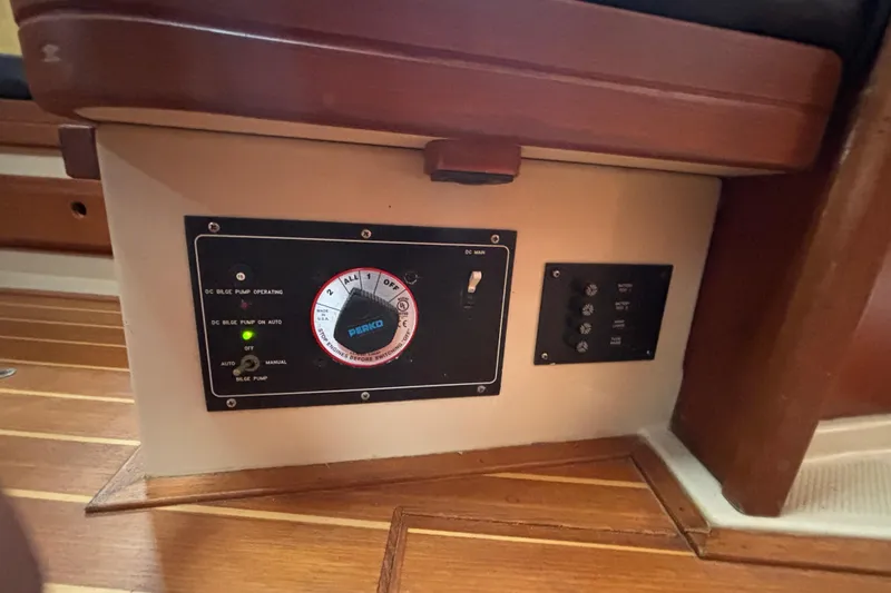 Slide: The Image of Control panel on a 1999 Island Packet 45 yacht interior. - 18
