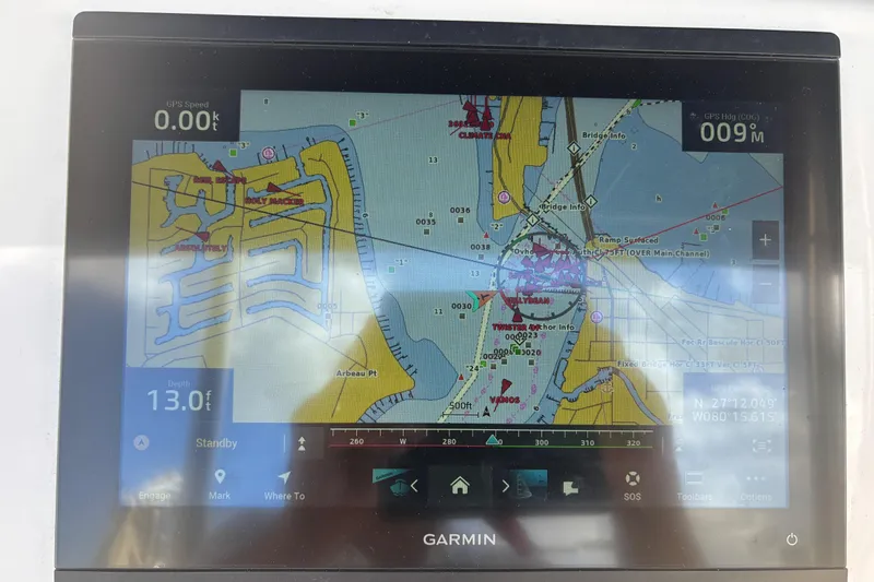 Slide: The Image of Garmin GPS display on 1999 Island Packet 45 sailboat, showing nautical chart and navigation data. - 23