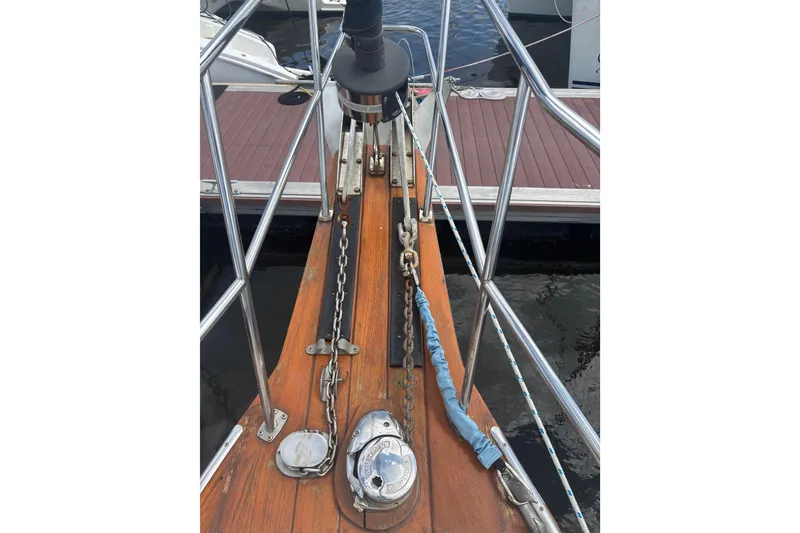 Slide: The Image of Bow of 1999 Island Packet 45 sailboat with anchor chain and deck fittings. - 24