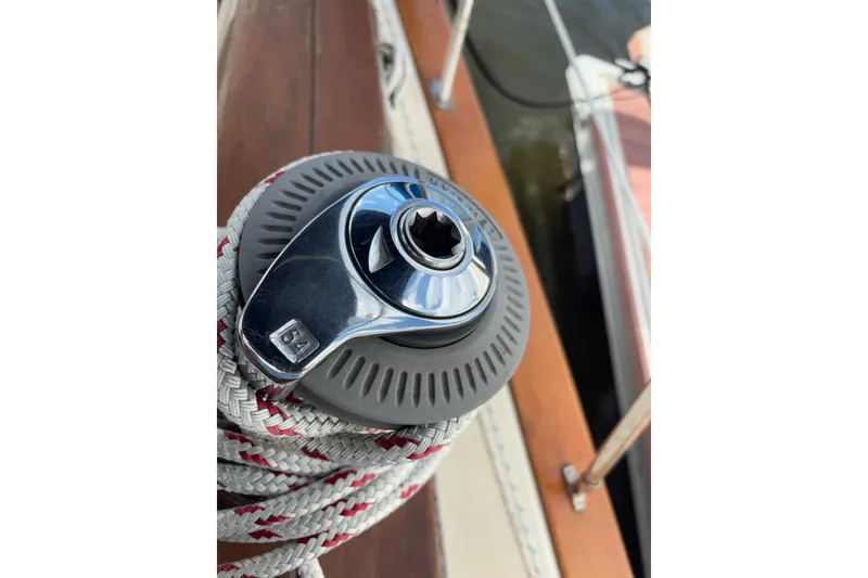 Slide: The Image of Winch on 1999 Island Packet 45 sailboat with coiled rope. - 28