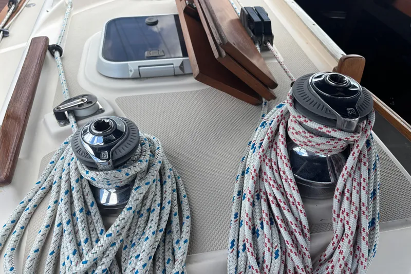 Slide: The Image of Winches and ropes on a 1999 Island Packet 45 sailboat deck. - 29