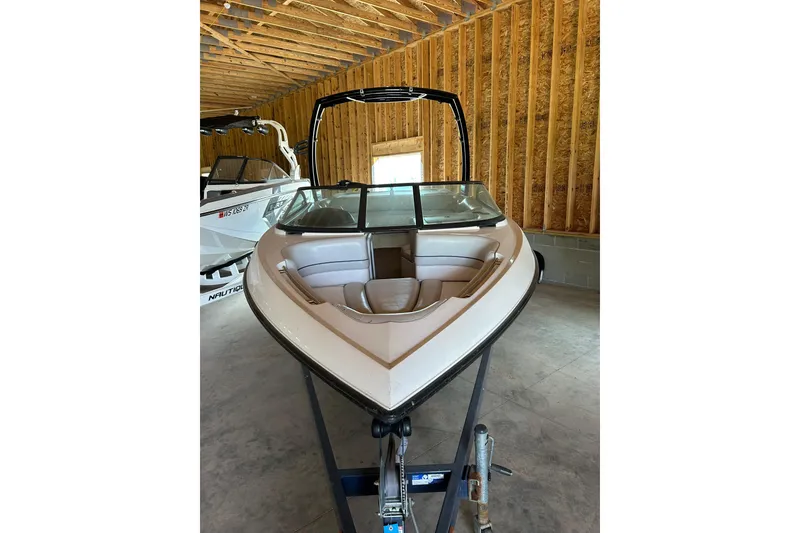 Slide: The Image of 2001 Gekko G3 boat in storage, featuring sleek design and comfortable seating. - 1