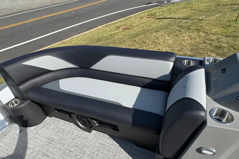 Slide: The Image of 2026 Tahoe Pontoon Sport 85 Quad Lounger 23 interior with sleek seating and cup holders. - 11