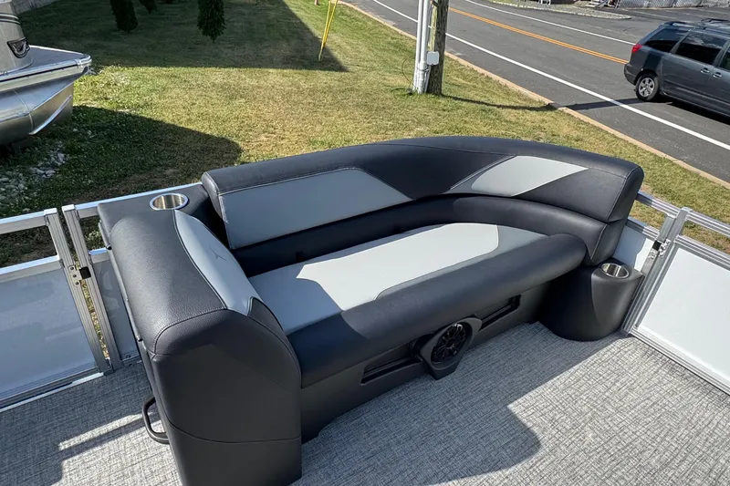 Slide: The Image of 2026 Tahoe Pontoon Sport 85 Quad Lounger 23 with sleek seating and cup holders. - 14