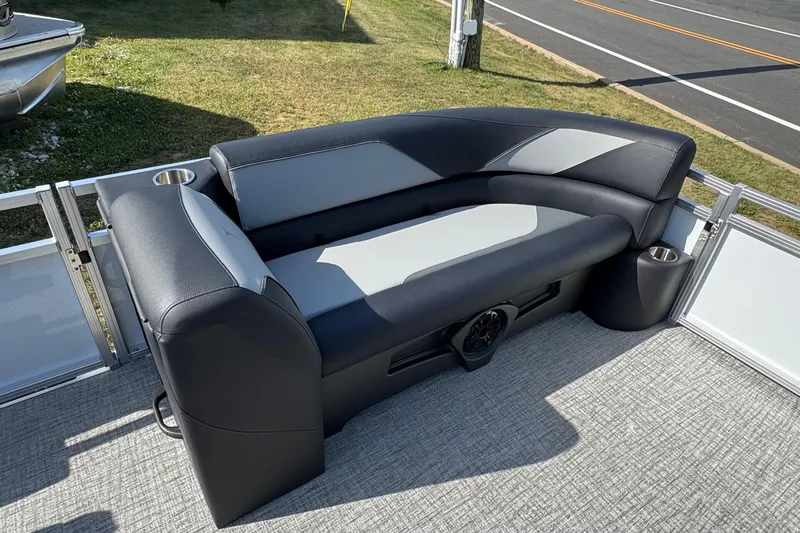 Slide: The Image of 2026 Tahoe Pontoon Sport 85 Quad Lounger 23 with sleek seating and cup holders. - 15