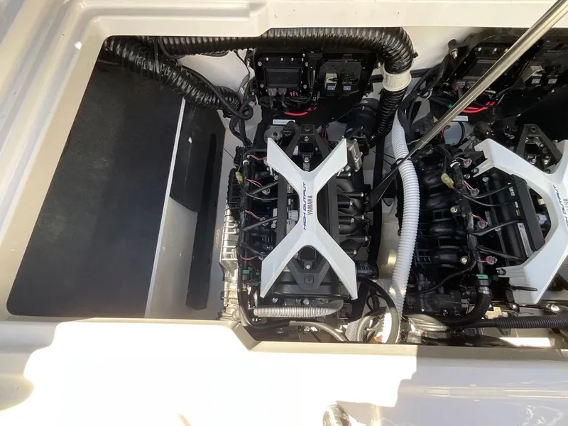 Slide: The Image of Engine compartment of a Yamaha 222SD boat with two engines and wiring. - 17