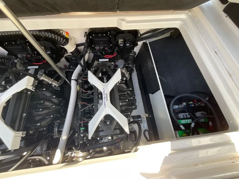 Slide: The Image of Engine compartment of a Yamaha 222SD boat with dual engines and batteries. - 18