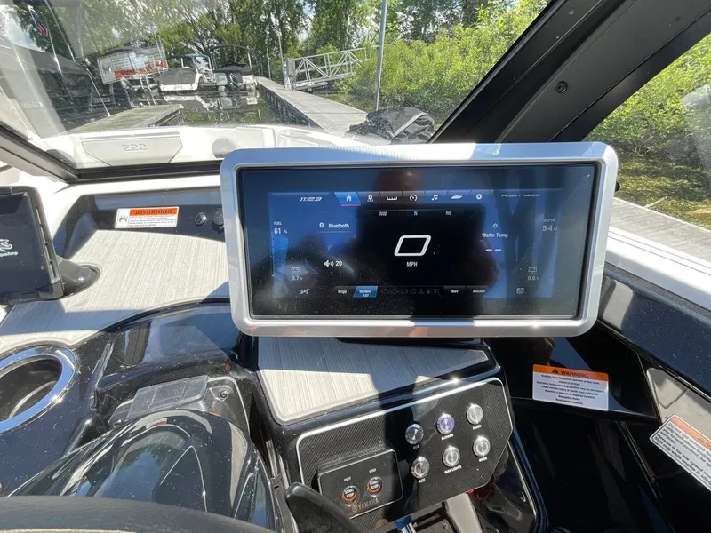 Slide: The Image of The image shows the dashboard of a Yamaha 222SD boat with a modern display. - 9