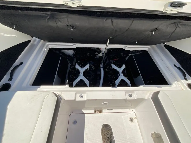 Slide: The Image of Engine compartment of a Yamaha 222SD boat with dual engines. - 15
