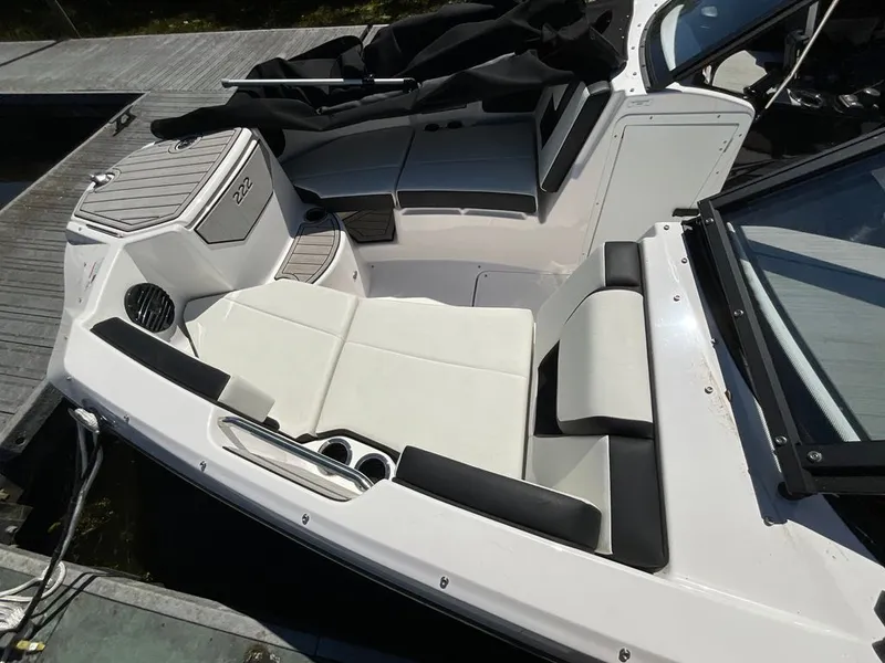 Slide: The Image of The image shows the cockpit of a Yamaha 222SD boat with white and black seating. - 6