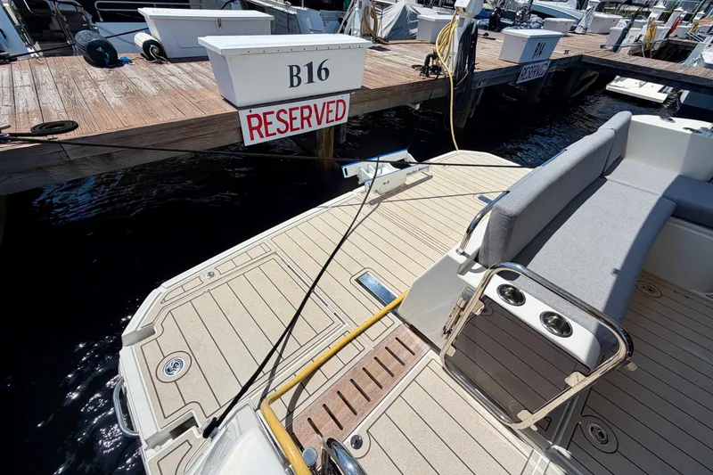 Slide: The Image of 2025 Beneteau Swift Trawler 41 Fly docked at reserved marina slip B16. - 17