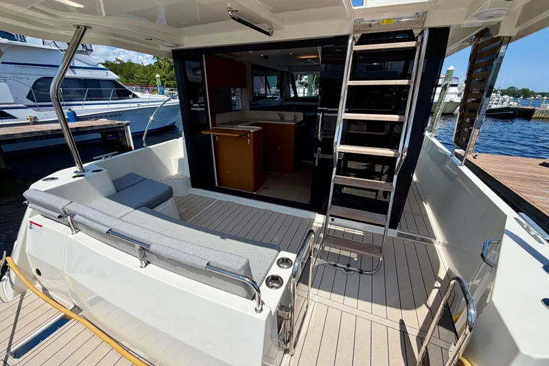 Slide: The Image of 2025 Beneteau Swift Trawler 41 Fly, featuring spacious deck and modern interior design. - 18