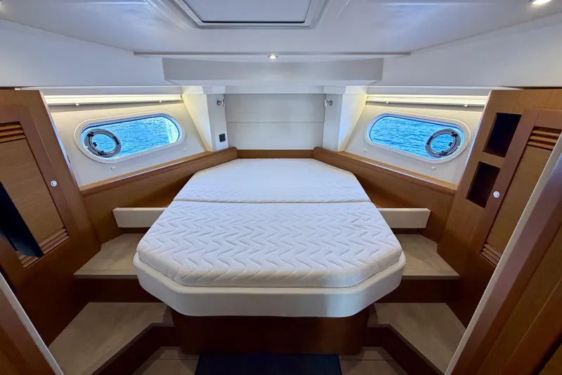 Slide: The Image of Luxurious cabin interior of 2025 Beneteau Swift Trawler 41 Fly with ocean view windows. - 25