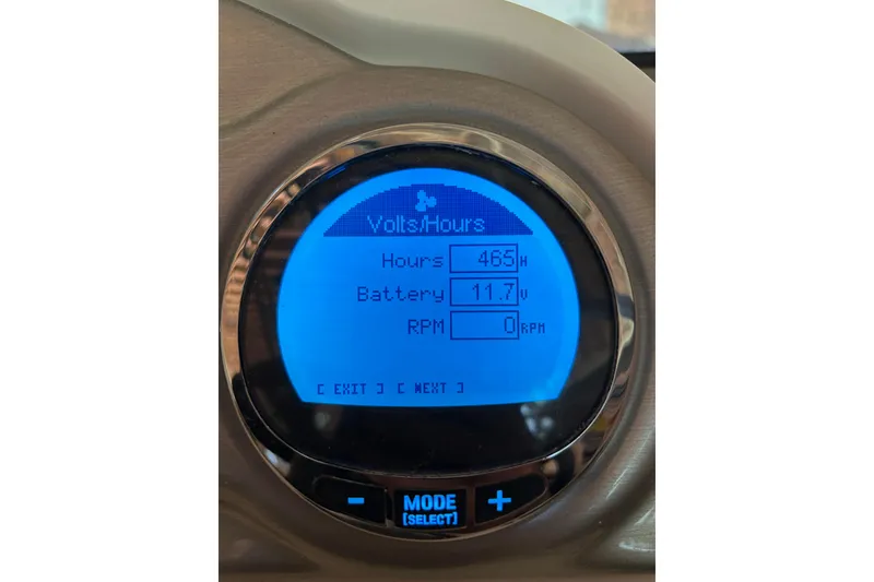Slide: The Image of Dashboard display of a 2015 Hurricane SunDeck 2400 IO showing hours, battery, and RPM. - 5