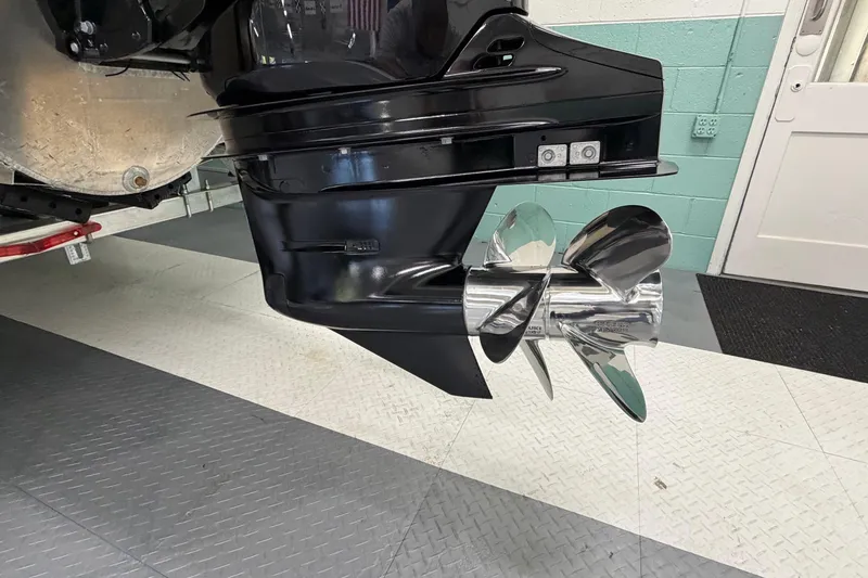 Slide: The Image of Close-up of a 2026 South Bay 525SB2 boat propeller in a garage setting. - 11