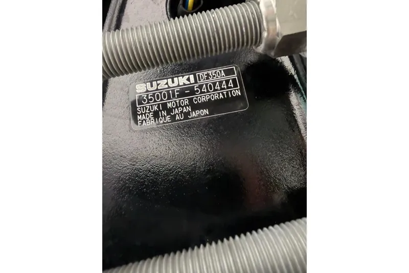 Slide: The Image of Label on Suzuki DF350A engine, serial number 35001F-540444, made in Japan. - 13