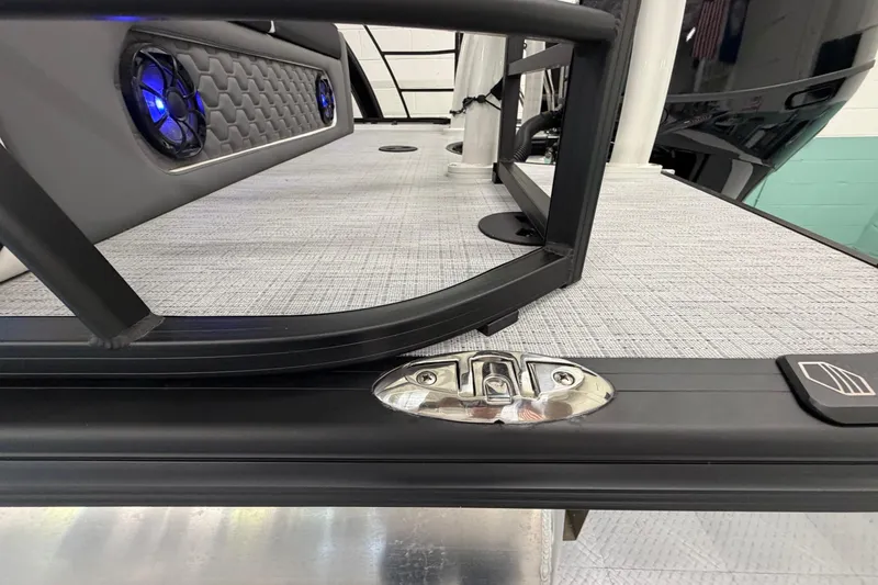 Slide: The Image of 2026 South Bay 525SB2 boat deck with sleek design and blue LED speakers. - 18