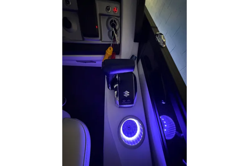 Slide: The Image of Interior of 2026 South Bay 525SB2 with illuminated controls and key ignition. - 25