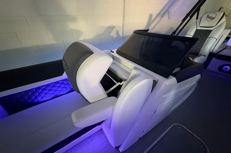 Slide: The Image of Luxurious interior of 2026 South Bay 525SB2 boat with modern seating and ambient lighting. - 44