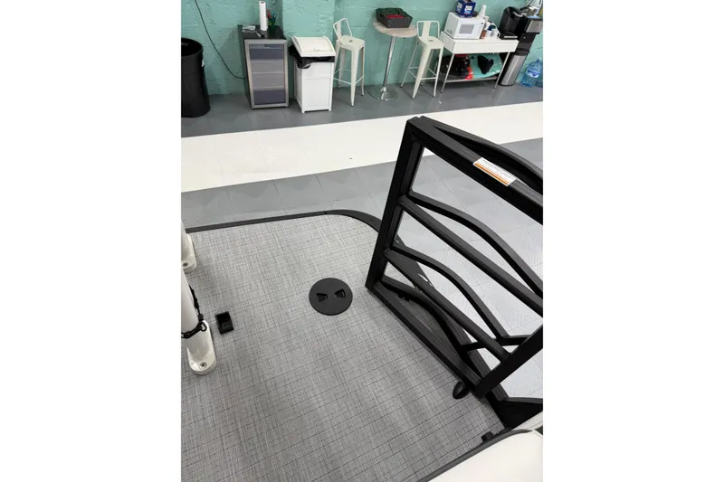 Slide: The Image of Interior view of a 2026 South Bay 525SB2 boat, featuring modern flooring and seating. - 46