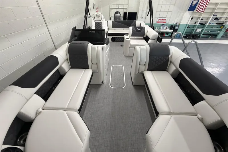 Slide: The Image of Interior of 2026 South Bay 525SB2 pontoon boat with luxurious seating and modern design. - 51