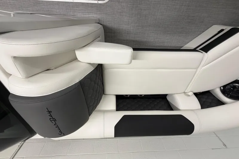 Slide: The Image of Luxurious seating in 2026 South Bay 525SB2 boat, featuring sleek white and black upholstery. - 54