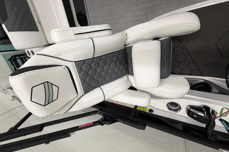 Slide: The Image of Luxurious white and gray seating in 2026 South Bay 525SB2 boat interior. - 63
