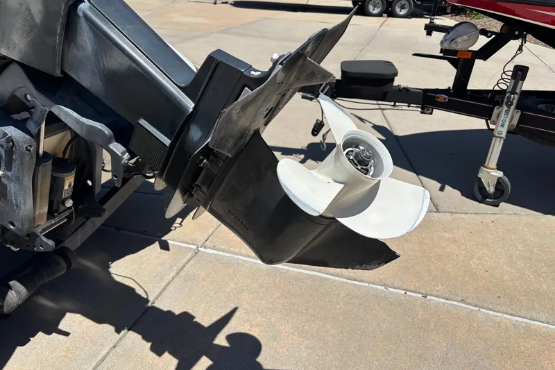 Slide: The Image of Outboard motor propeller of a 1998 Nitro 700 LX DC boat on a trailer. - 7