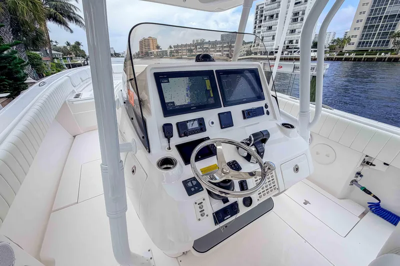 Slide: The Image of 2019 Intrepid 400 Center Console boat with advanced navigation system and sleek design. - 36