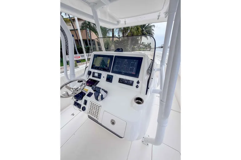Slide: The Image of 2019 Intrepid 400 Center Console helm with advanced navigation displays and controls. - 34