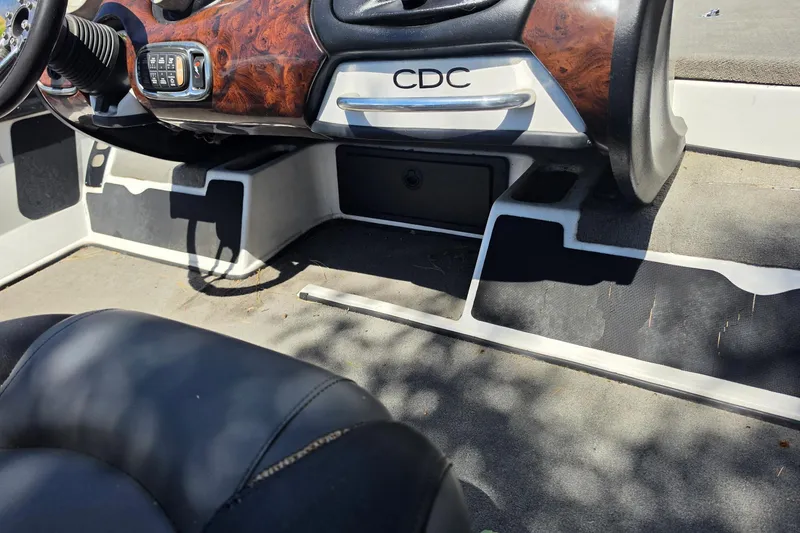 Slide: The Image of Interior of a 2008 Nitro Z-9 boat with wood panel dashboard. - 3