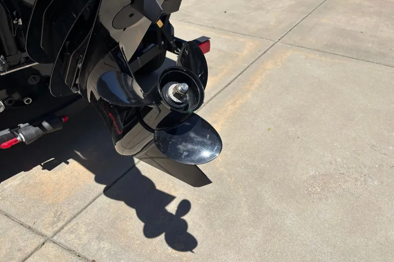 Slide: The Image of Propeller of 2025 Tracker Pro Guide V-175 Combo boat on concrete surface. - 7