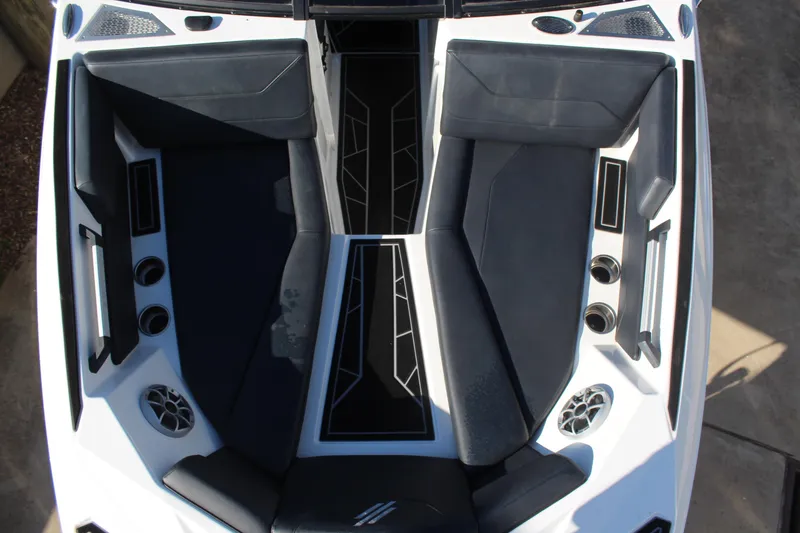 Slide: The Image of 2024 ATX Surf Boats 22 Type-S interior with sleek seating and modern design elements. - 13