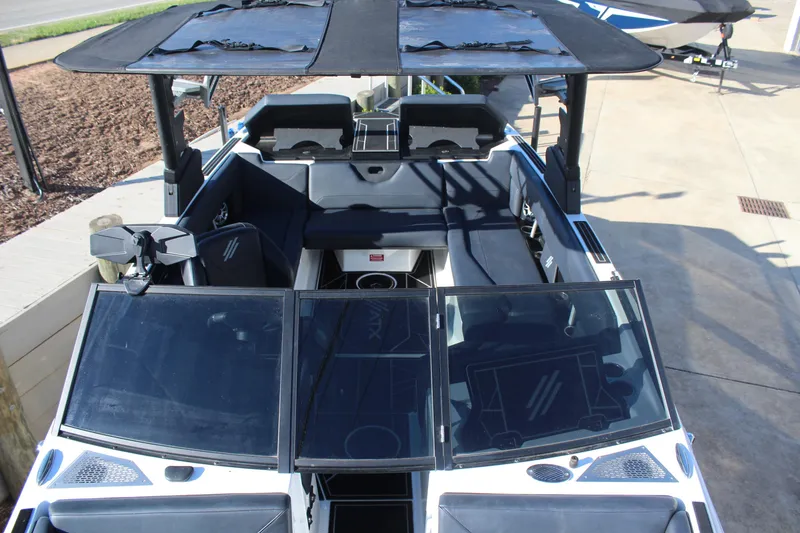 Slide: The Image of 2024 ATX Surf Boats 22 Type-S interior view, showcasing seating and dashboard features. - 14