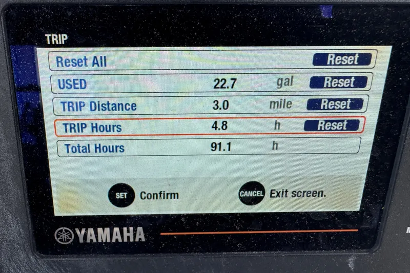 Slide: The Image of Yamaha display showing trip data: 22.7 gallons used, 3 miles, 4.8 trip hours. Tidewater 232 SS 2022. - 1