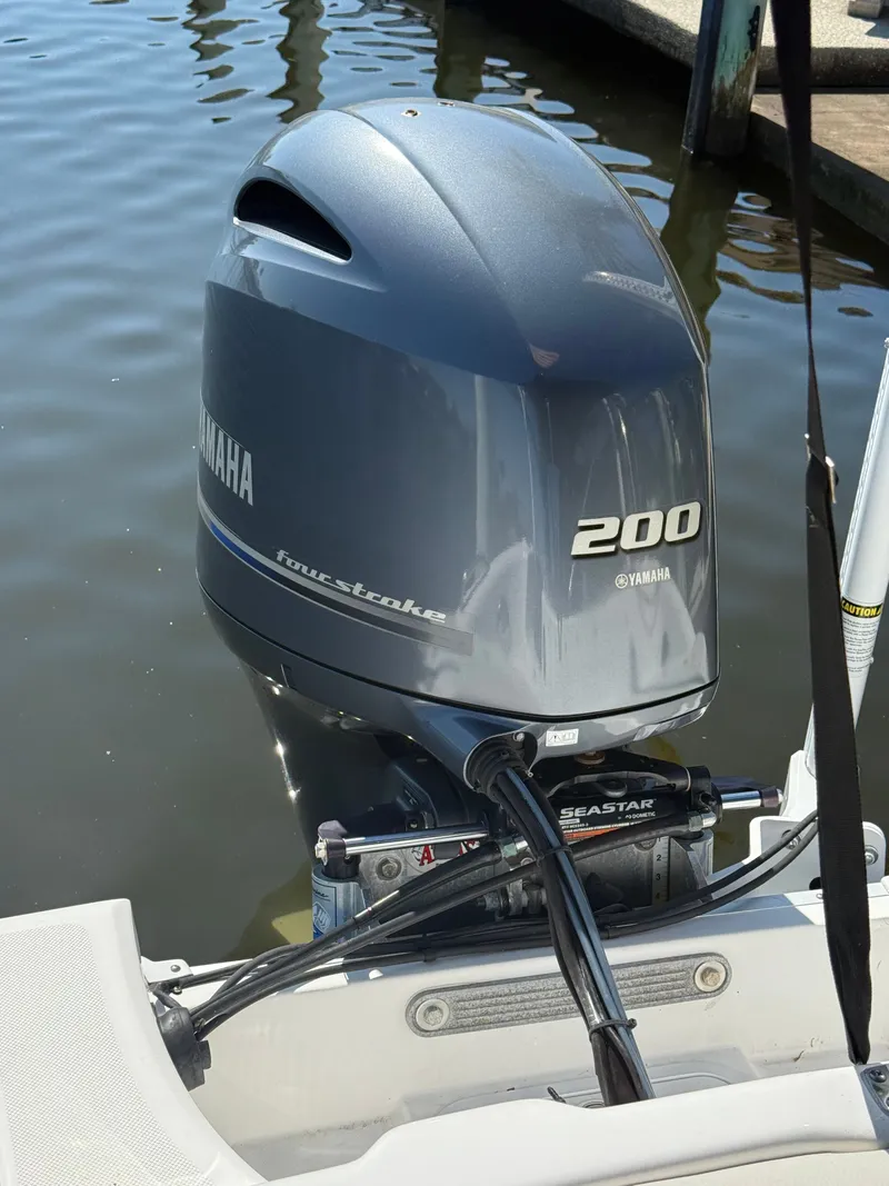 Slide: The Image of Outboard motor of a boat at the dock. - 4