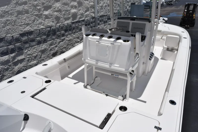 Slide: The Image of 2022 Caymas 26 HB boat interior with Garmin electronics and spacious deck layout. - 7