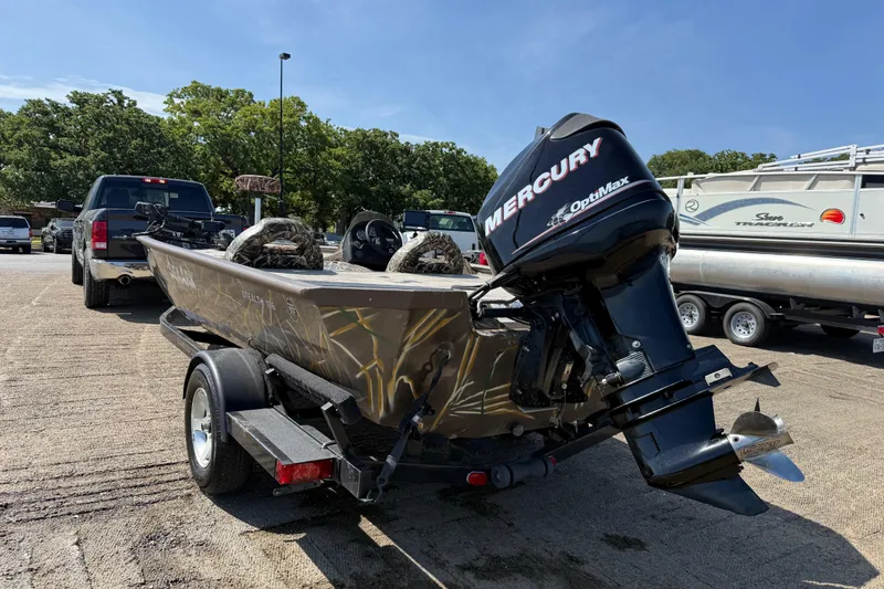 Slide: The Image of 2010 SeaArk Stealth 190 boat with Mercury OptiMax engine on trailer. - 8