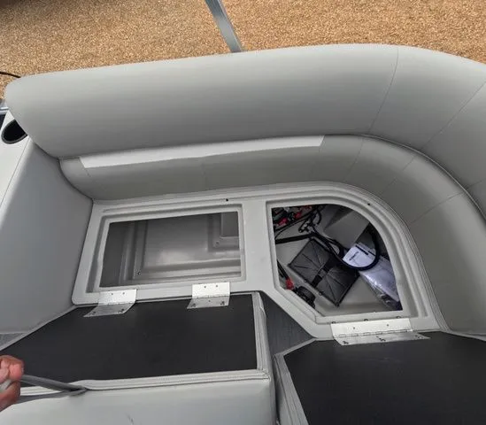 Slide: The Image of Interior view of a Godfrey Xperience Lounge 2286 SBX with gray upholstery and storage compartments. - 9