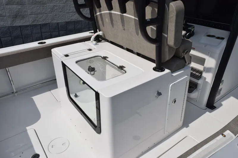 Slide: The Image of 2026 Sea Hunt Gamefish 28 Coffin Box interior, featuring seating and storage compartments. - 7