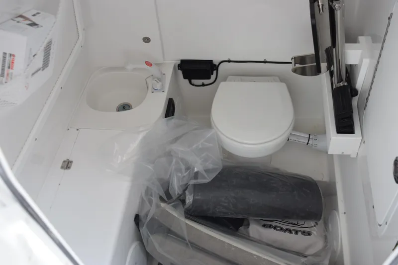 Slide: The Image of Interior of 2026 Sea Hunt Gamefish 28 Coffin Box boat with toilet and sink. - 15